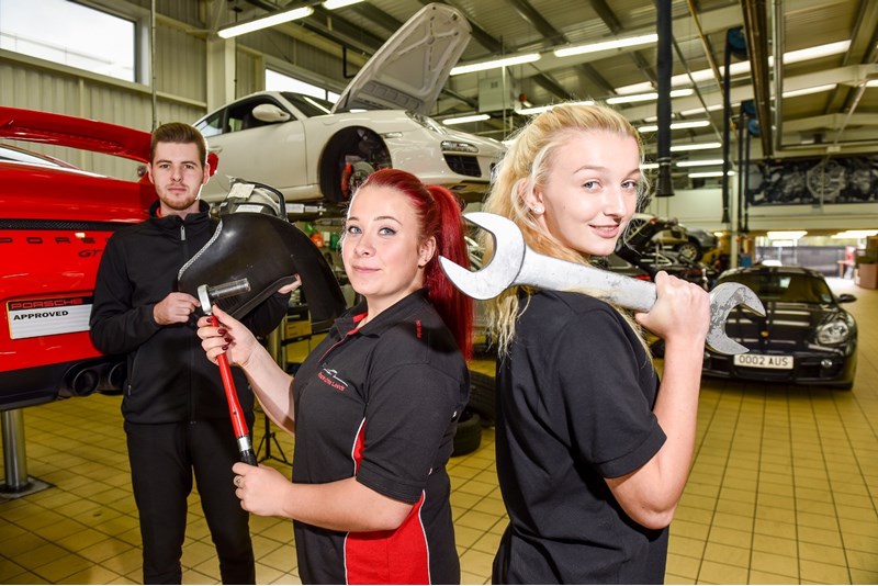 Three JCT600 apprentices at Porsche Centre Leeds: parts apprentice Jake Murrell (19); and apprentice technicians Stacey Chandler (left), aged 19 with 16-year-old Jessica Suffield Three JCT600 apprentices at Porsche Centre Leeds