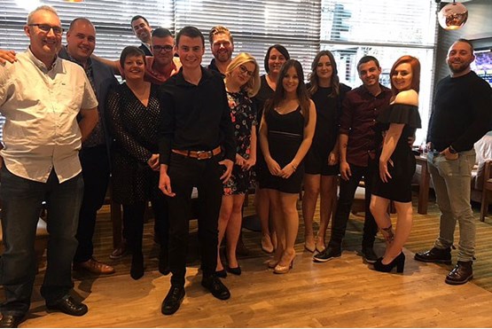 The Drayton Motors team winning their award  at the National Dealership Conference