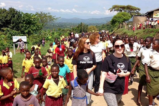Peter Vardy partners on a charity work trip to Uganda where they met some of the children they sponsor