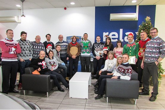 Premier Ford staff members raising money  for charity in their Christmas jumpers