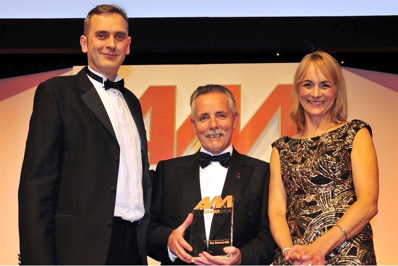 AM editor Jeremy Bennett presents the award to Ray Sommerville, Perrys Motor Sales