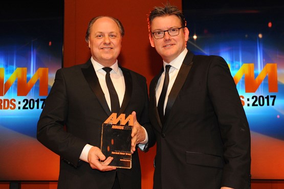 Philip J Deacon, head of marketing, Marshall Motor Group, accepts the award for Best Use of Social Media from Jeremy Evans, managing director, Marketing Delivery