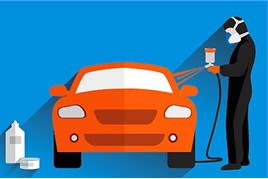 Car being spray painted